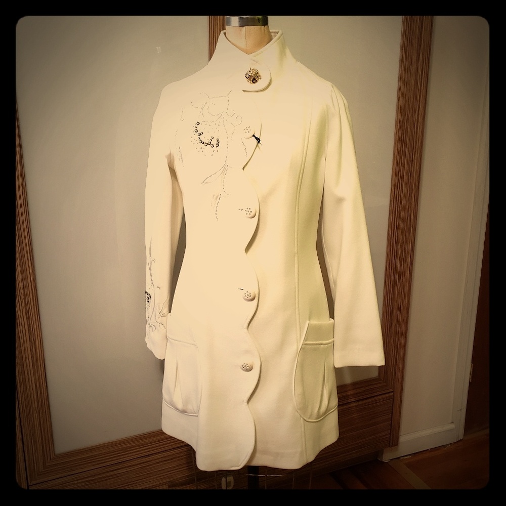 White coat with stone decoration at f